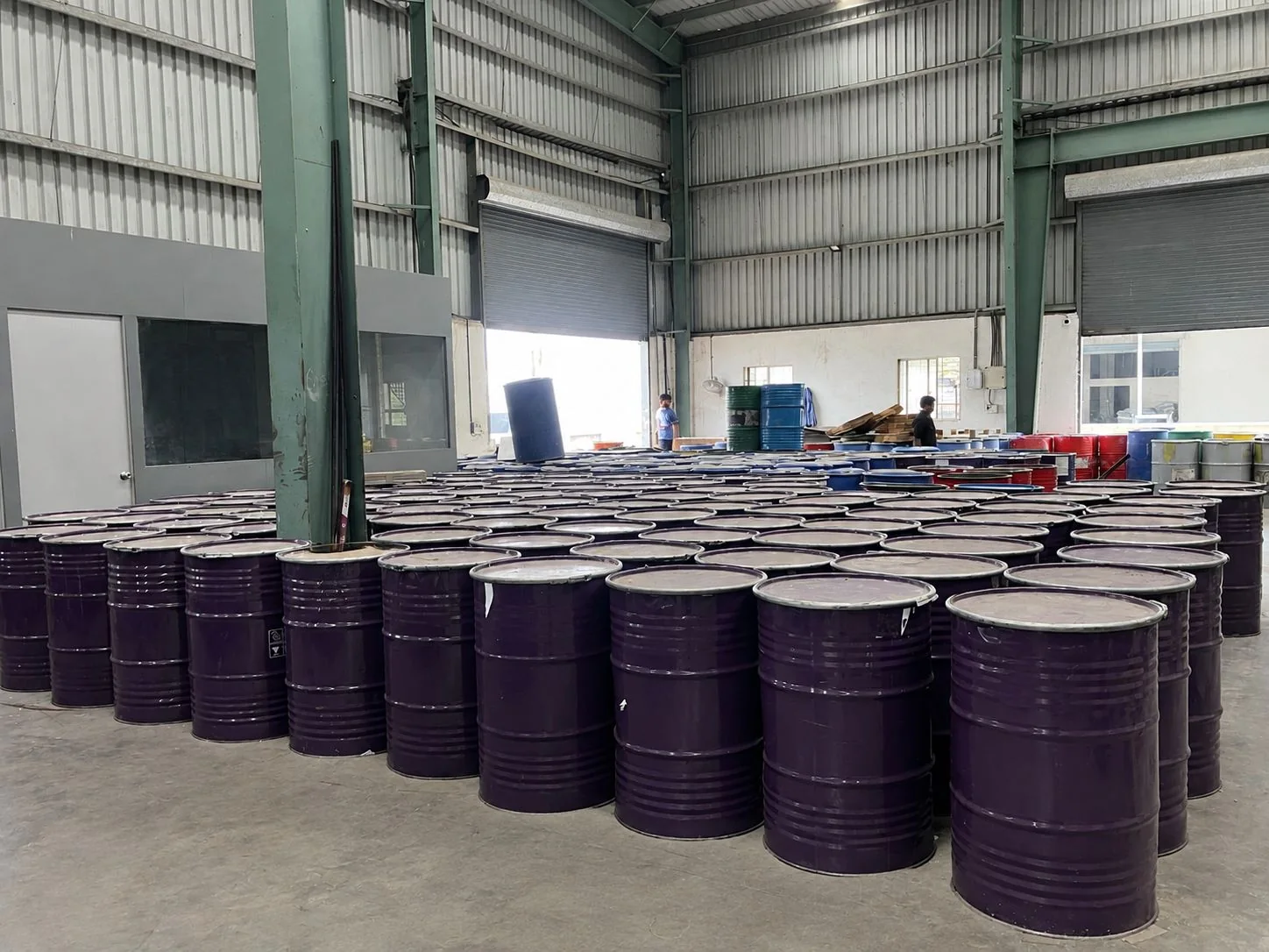 Finished lubricant storage with drums and cartons in the Goldtap warehouse