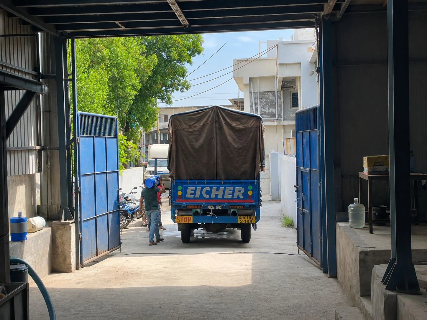 Eicher truck loading at the Goldtap Lubricant Specialities factory entrance in Changodar, Ahmedabad